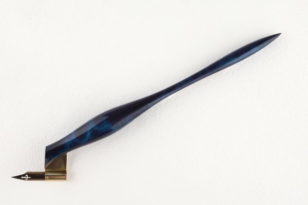 Pen holder made of dyed curly maple, finished with clear coat.